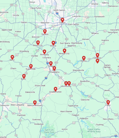 A map showing towns and highways in eastern Ohio, marked with several red location pins indicating specific points of interest.